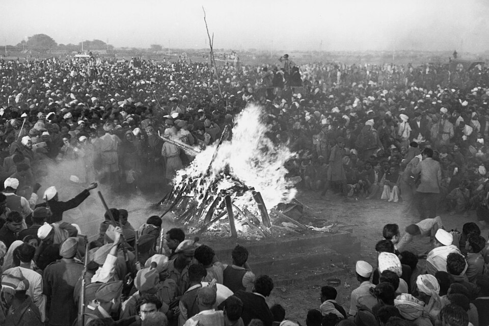 Cremation of Mahatma Gandhi at Rajghat, 31 January 1948. It was attended by Jawaharlal Nehru, Lord and Lady Mountbatten, Maulana Azad, Rajkumari Amrit Kaur, Sarojini Naidu and other national leaders. His son Devdas Gandhi lit the pyre.[115]