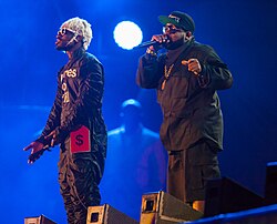 André 3000 (left) and Big Boi performing in 2014