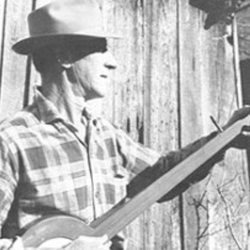 Proffitt playing a banjo.