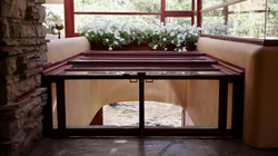 The hatch in the living room, which leads to a staircase to Bear Run
