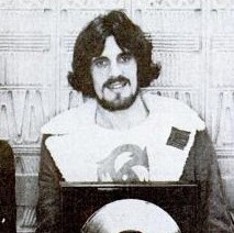 Capaldi accepting a Gold record for Traffic in 1972