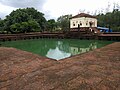 Safa Masjid adjacent to which, on the south, is a masonry tank measuring 30 by 30 m (98 by 98 ft), with Mihrab designs