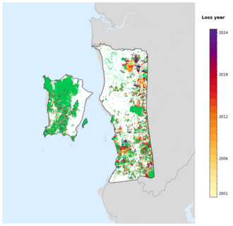 Map of Penang showing tree-cover loss years, with forest remaining since 2000 in green and loss years shaded yellow through purple.