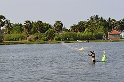 Pottuvil, Sri Lanka, Fisherman trying to catch fish