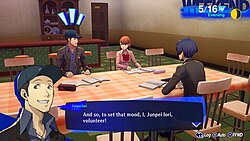 A screenshot of Persona 3 Reload. Showcasing a study event, it shows the Protagonist and his friends, Yukari Takeba and Junpei Iori at their dorm's table, with a checkered covering over the table. On the table, various study materials are placed, like notebooks, erasers, and pencil cases correlating to each character. The text box is a shade of dark blue, showing dialogue from Junpei: "And so, to set the mood, I, Junpei Iori, volunteer!"