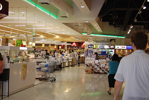 Inside the former Torrance location. The grocery store is to the left, the main food court upper right, and specialty stores selling books and videos lower right.