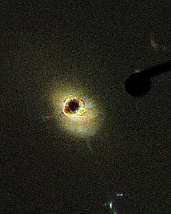 Quasar 3C 273 as imaged by the Hubble Space Telescope's Advanced Camera for Surveys.