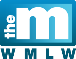 A light blue rectangle appears. Within it, white text appearing vertically and reading upward features "the" rendered in bold lower-case. Next to it, a thicker letter "m" in lower-case fills the remainder of the rectangle, thus reading to the eye as "the m". Below the rectangle, the letters "W M L W" appear in bold blue sans-serif.