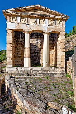 Ancient Greek Doric columns and entablature of the Athenian Treasury, Delphi, Greece, c.525 BC[14]