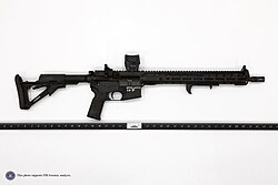The rifle used by Crooks during the assassination attempt, with visible damage to the stock of the firearm after being struck by police gunfire at Crooks