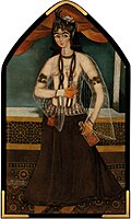 Woman holding a bottle and glass