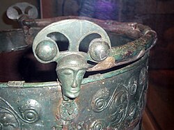 A copper head on the Aylesford bucket, British Museum.: 119 