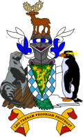 The arms of South Georgia and the South Sandwich Islands feature a fur seal and macaroni penguin as supporters.
