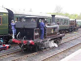 London, Brighton and South Coast Railway locomotive. Note the three pipes: one for the vacuum brake, one for the air brake, and one for the steam heat