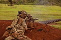 U.S. infantryman firing an M250 with the M157 fire-control system, 2025