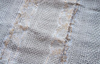 A cocoon fabric with raya kalado from Lumban, Laguna. Making these can take several months to complete.