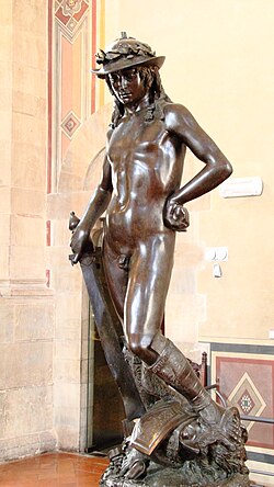 A statue of an androgynous nude boy