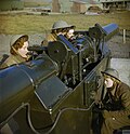 ATS servicemembers operating a height and range finder, calculating data on enemy aircraft for passing to the Gun Post Officer, December, 1942