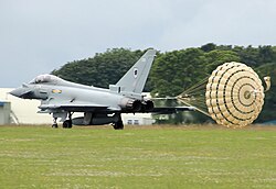 RAF Typhoon using a drogue parachute for braking after landing.
