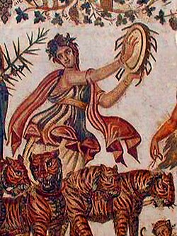 Maenad playing a tympanum. Detail from the Triumph of Dionysus, on a Roman mosaic from Tunisia (3rd century AD).