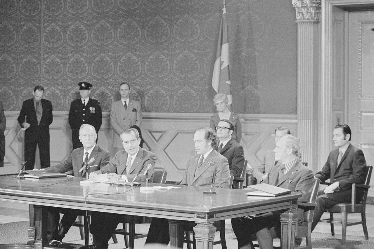 President Nixon and Prime Minister Trudeau at the signing ceremony for the Great Lakes Water Quality Agreement - NARA - 194763 (restored).jpg