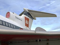 A left-quarter view of a jet airliner wing and tailplane. On the tail fin are the words 'Trident Two' and the letters 'BEA' and G-AFVB'.