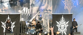 Celtic Frost live at Tuska Open Air Metal Festival 2006. The band's distinctive skull-and-swords logo can be seen on the banners.