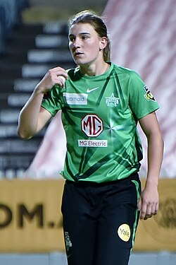 Annabel Sutherland wearing a green Melbourne Stars jersey
