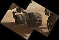 Curiosity's wheels - Aeolis Mons is in the background (MAHLI, September 9, 2012).