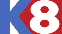 A blue K next to a red pentagon shape containing a white numeral 8