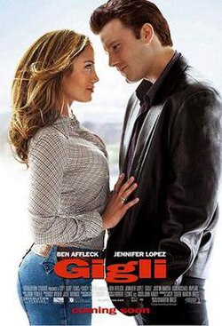 A man and woman face each other closely; the woman rests a hand on the man's chest. The title appears below them in large red letters, above the billing block.