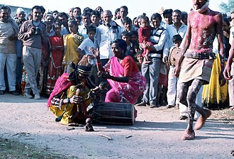 A hijra in a traditional village performance