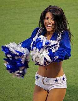 A Dallas Cowboys Cheerleader wearing uniform hotpants, 2011
