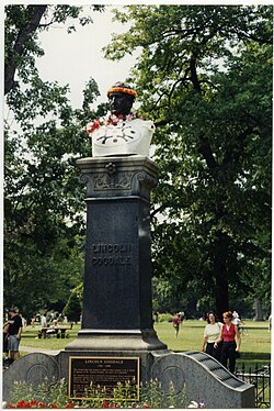 Bust of Lincoln Goodale in Goodale Park, Columbus, decorated in different ways for ComFest and holidays, showing festive adornments across multiple years.