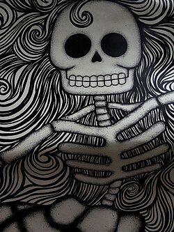 A calaca of La Calavera Catrina