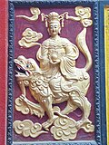 Mañjuśrī on lion with cintamani. Quan Am Temple, Ho Chi Minh City.
