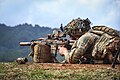 U.S. Army infantryman firing an M7 rifle with M157 fire control optic