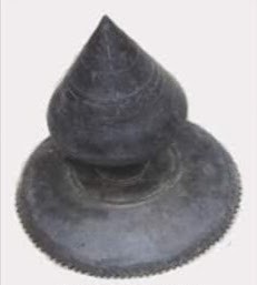 Upper metal part of an ancient Varun (Tupi) Japi known as Sula used during the rule of Sutiya kings kept in the Gharmora Satra.