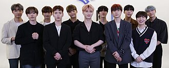 Omega X in June 2021. From left to right: Jaehan, Xen, Taedong, Hwichan, Hyuk, Hangyeom, Junghoon, Jehyun, Yechan, Kevin, Sebin.