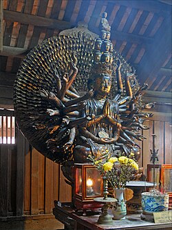 Avalokiteśvara of One Thousand Arms, lacquered and gilded wood. Restored in 1656 CE. Bút Tháp Temple, Bắc Ninh Province, Vietnam.