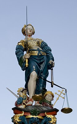 Lady Justice with sword, scales and blindfold on the Gerechtigkeitsbrunnen in Bern, Switzerland, 1543