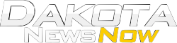 The word Dakota, italicized in Bank Gothic typeface large in white, with "News Now" beneath in white, unitalicized, and yellow, italicized.
