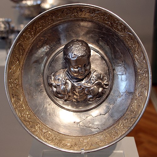 A Roman gilded silver bowl depicting the boy Hercules strangling two serpents, from the Hildesheim Treasure, 1st century CE, Altes Museum