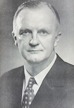 A black and white photograph of a man