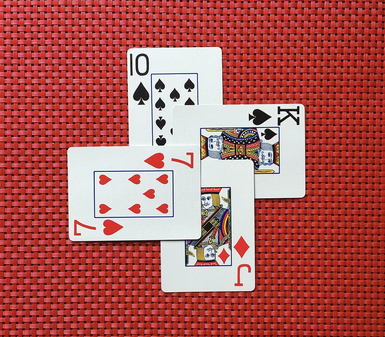 Four overlapping playing cards.jpg