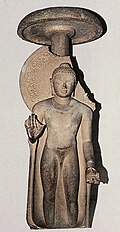 Buddha, standing under a chatra umbrella, inscribed: "Gift of Abhayamira in 154 GE" (474 CE) in the reign of Kumaragupta II. Sarnath Museum.[7]