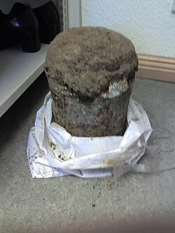 Ash capsule and cinerary urn after 15 years