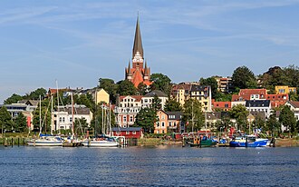 Flensburg is the largest town in Angeln. View of the borough of Jürgensby (Jørgensby) on the Angeln side of the Flensburg Firth.