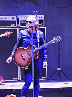 Roland in front of a microphone