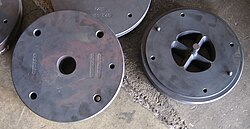 Aluminum extrusion die set showing male and female components used to shape tubes.